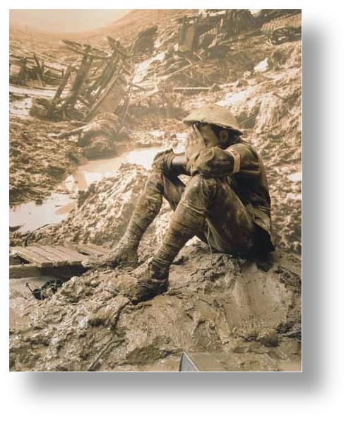 Distraught soldier sitting in mud.