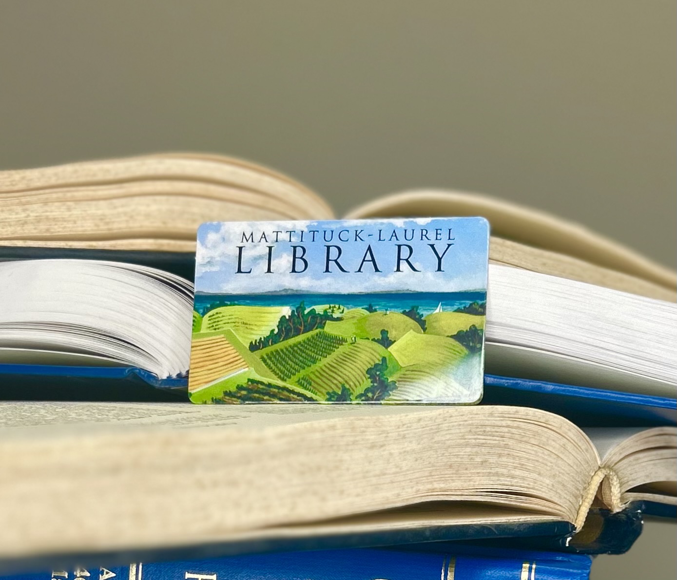 Matt-Laurel - Library Card on Stack of Books
