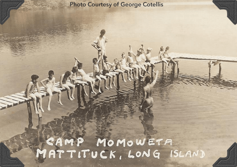 Boys on lake doc swimming Camp Momoweta Mattituck, Long Island